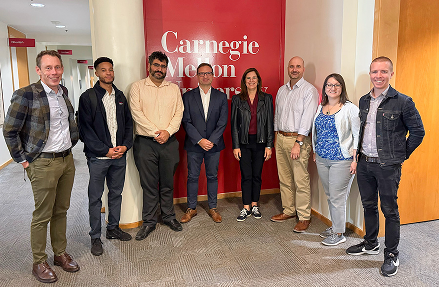 Christina Cassotis poses for photo with Scott Institute Faculty and Staff