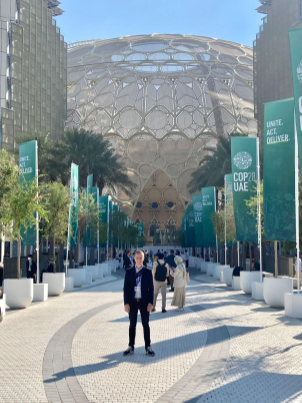 Daniel Tkacik standing outside COP28