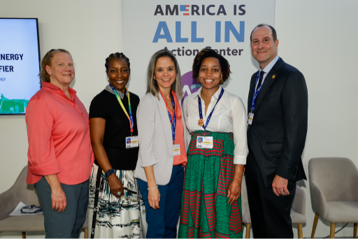 Destenie Nock stands with other panelists