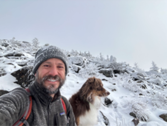 Jeremiah Johnson and his dog on a snowy expedition